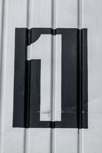 istock Number one painted on a door close up 1988689244