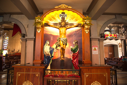 Statue of Jesus on the altar at Basilica Minore del Santo Nino, the oldest church in the Philippines. Built in 1565 by Spanish colonists.