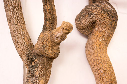 Wooden Carving of an Owl in a Clearing in a Wood at Buckland Abbey Estate, near Plymouth, Devon, England, UK