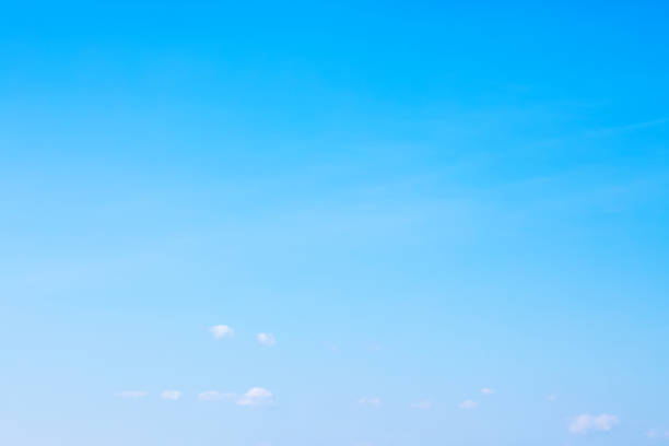 istock Fantastic soft white clouds against blue sky and copy space horizontal shape 1988726602