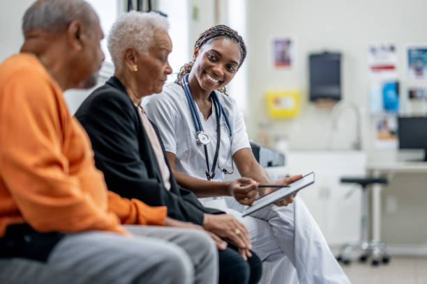 istock Senior Couple Medical Appointment 1988752064