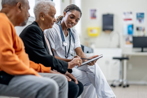 istock Senior Couple Medical Appointment 1988752066