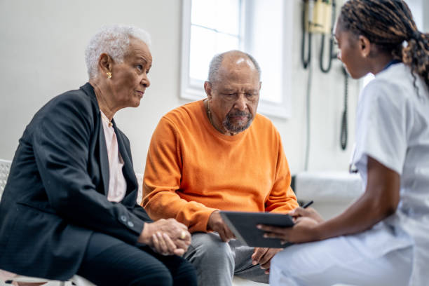 istock Senior Couple Medical Appointment 1988752084