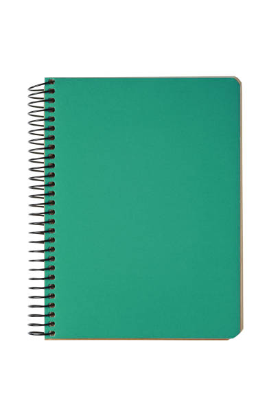 istock Closed spiral bound notepad with green cover isolated on white background 1988783094