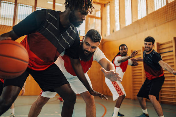 istock Interracial professional basketball players having training. Action. 1988812132