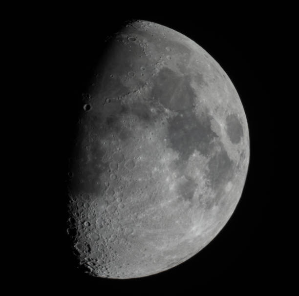 istock Moon in growing phase (waxing gibbous). Taken by telescope. Awes 1988816342