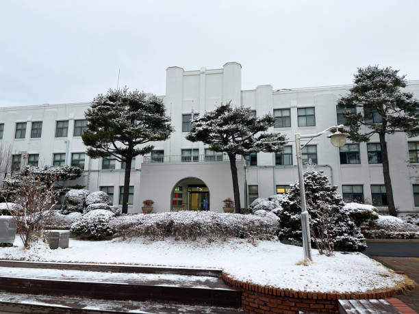 istock Snowy Day Old High School Building 1988831007