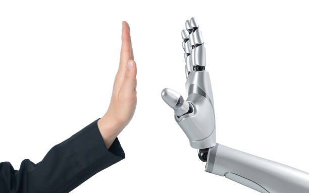 istock Ai hand with human hand trying to high five each others isolated on white background. 1988844506