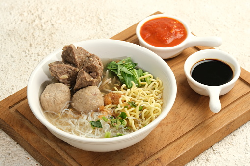 Bakso or Baso .Indonesian Meatball Soup Served With Noodle and Sambal