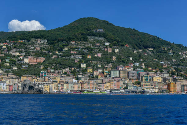 Panorama of Castle della Dragonara and Basilica Santa Maria Assunta. Colorful buildings near the ligurian sea beach of Bagni Lido in Camogli, Italy.