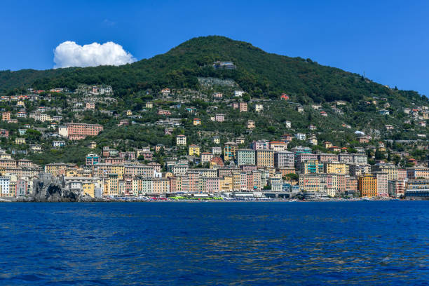 Panorama of Castle della Dragonara and Basilica Santa Maria Assunta. Colorful buildings near the ligurian sea beach of Bagni Lido in Camogli, Italy.