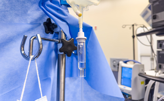 hospital IV drip, conveying medical care, treatment, and hope for recovery in a clinical setting
