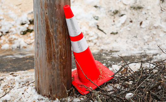 construction cone on urban street, symbolizing progress, safety, and infrastructure development
