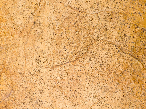 istock Dark concrete texture with a crumpled paper backdrop 1988977069