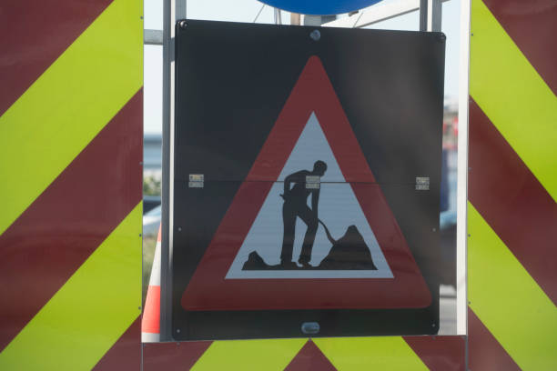 Infrastructure repair symbol. Caution in public road zones.