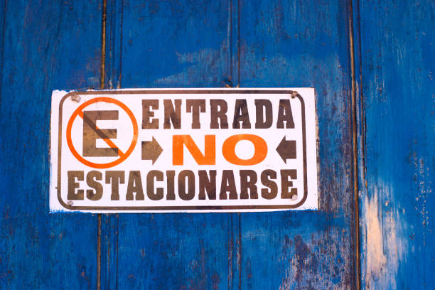 Mexico: “NO PARKING” Sign in Spanish Close-Up. Shot in Oaxaca.
