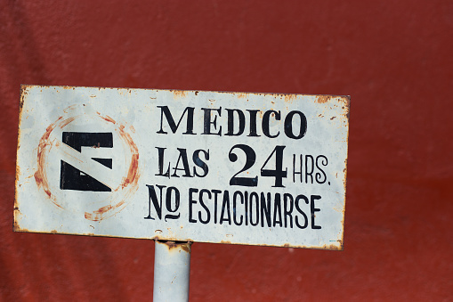 Mexico: “NO PARKING” Sign in Spanish Close-Up. Shot in Oaxaca