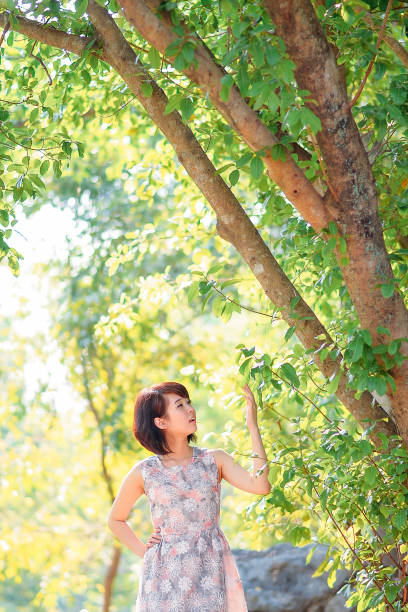 istock cute Chinese woman in nature 1989100691