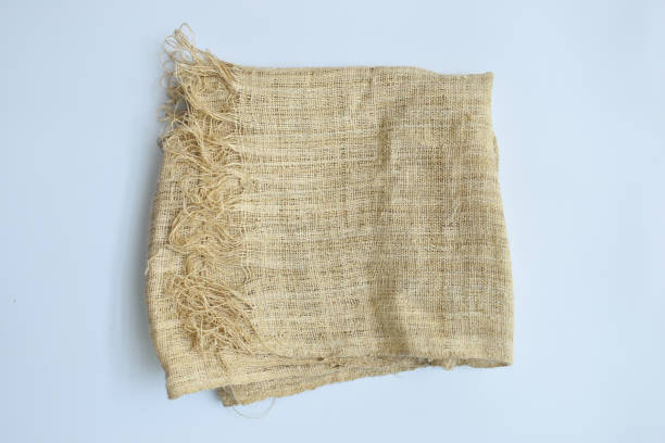 istock torn sackcloth isolated on white background, burlap fabric texture for design 1989118178