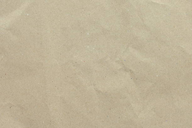 istock blank brown paper texture background, old page for craft design 1989130558
