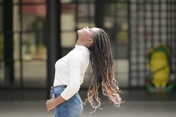 istock A young woman with his hairstyle 1989134733