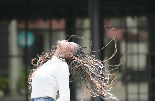 istock A young woman with his hairstyle 1989134741