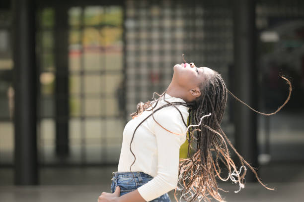 istock A young woman with his hairstyle 1989135257