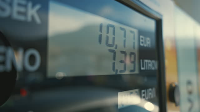 SLO MO Closeup of Digital Screen on Gas Pump in Euro Showing Cost of Pumped Gallons of Gasoline