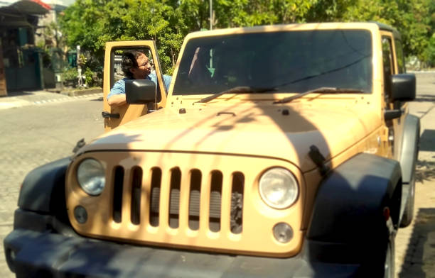 Jeep Wrangler sport utility vehicle at Hermann Park Conservatory. Houston, TX | Autumn 2022