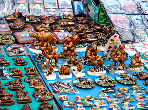 various brown ceramic figurines at the flea market