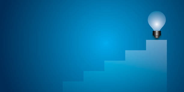 istock Light bulb with stair on dark blue background. Ideas inspiration concepts of business start up or goal to success. 1989242239
