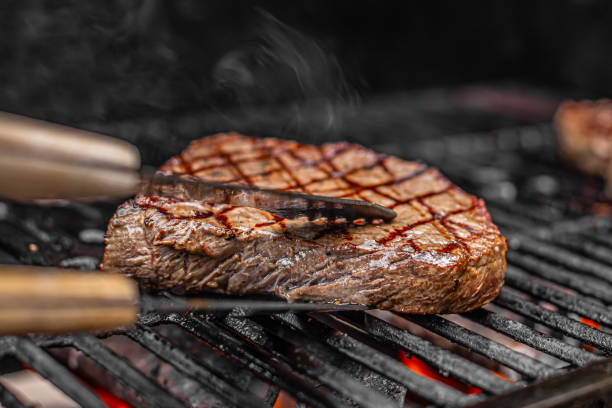 istock Steak on the grill. 1989273333