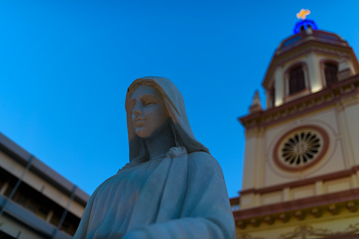 Santa Cruz Church illuminated at twilight , Historic Thai-Portuguese Neighborhood Dating Back to the Ayutthaya Period, in Bangkok, Thailand.