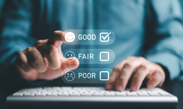 istock User give rating to service experience on online application, Customer review satisfaction feedback survey concept, Buyer evaluate quality of service or product leading to business reputation ranking. 1989389517
