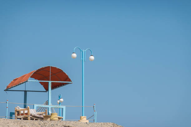 cozy place with a hammock and a lantern at a high place from the beach in egypt