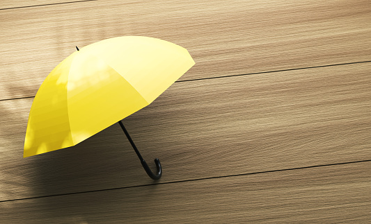 Umbrella On The Table. Close Up Concept.