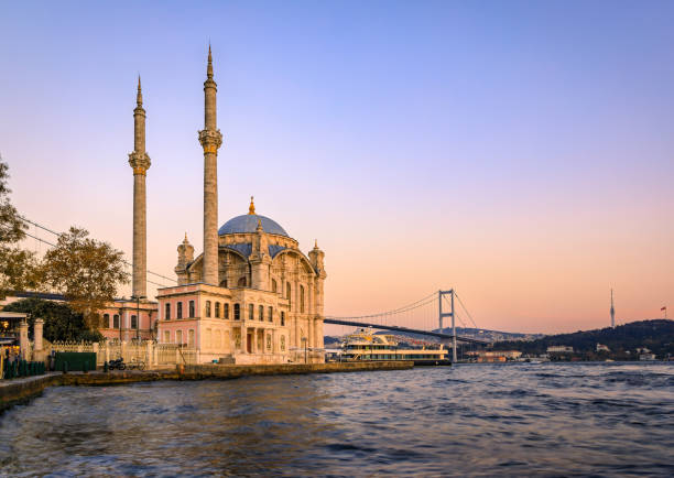 istock Sunset over Bosphorus and Grand Mecidiye Mosque Ortakoy Mosque, Istanbul, Turkey 1989446570