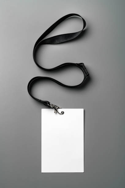 istock Blank nametag on gray background copy space 1989450193