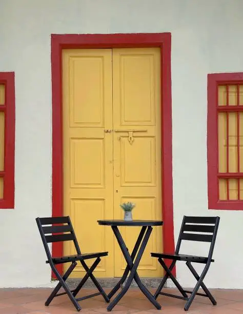 Wooden chairs and table in heritage Penang