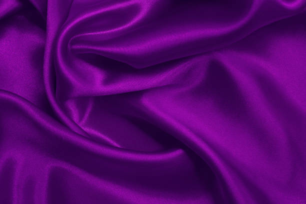 istock Dark purple fabric texture background, detail of silk or linen pattern. 1989471644