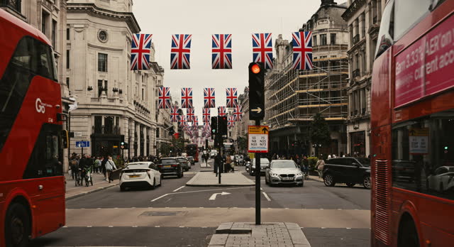 Slow motion video of Union Jacks on Oxford Street, London, UK