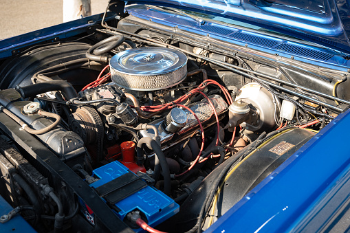 Montmelo, Spain – December 15, 2023: Detail of the large carbureted v8 big block engine of the American Dodge Polara