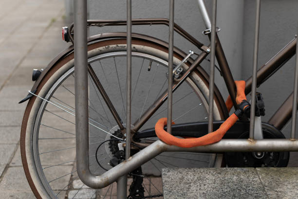 istock bicycle in a city on a iron railing 1989531677