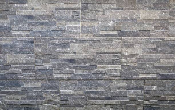 istock Stone panel coating wall with gray shades colors. Full frame 1989532336