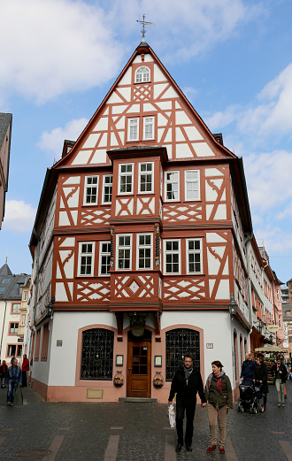 Mainz, Germany-March 28,2015:Unidentified people walking around Old Half-timbered Buildings at Old Town