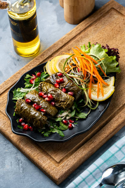 istock Grape leaves rolls stuffed with rice and meat, a popular Turkish-Arab appetizer dish 1989571798
