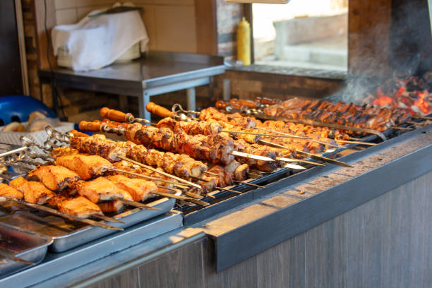 istock Fried meat on skewers on the grill 1989594103