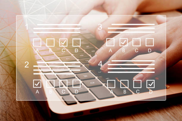 istock E-learning, education, online exam concept. Choose correct answer. Education internet online digital technology concept. 1989608294