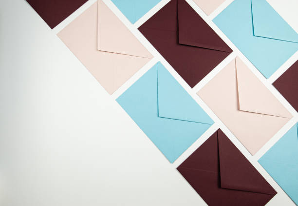 istock Top view of colourful envelopes on white background. 1989635741