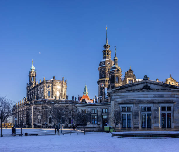 On January 20th 2024, Dresden Cathedral and Residenz Castle looking from Theater Square in a snowy winter day